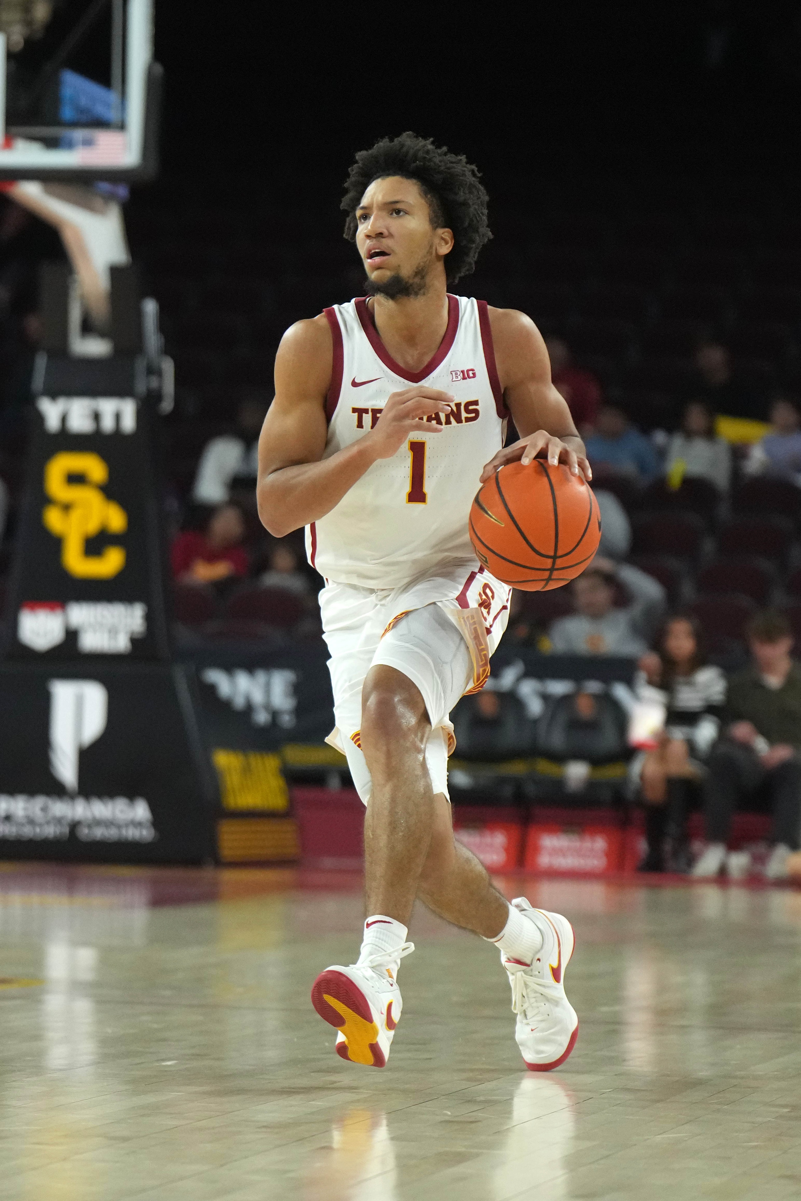 college basketball picks Desmond Claude USC Trojans predictions best bet odds