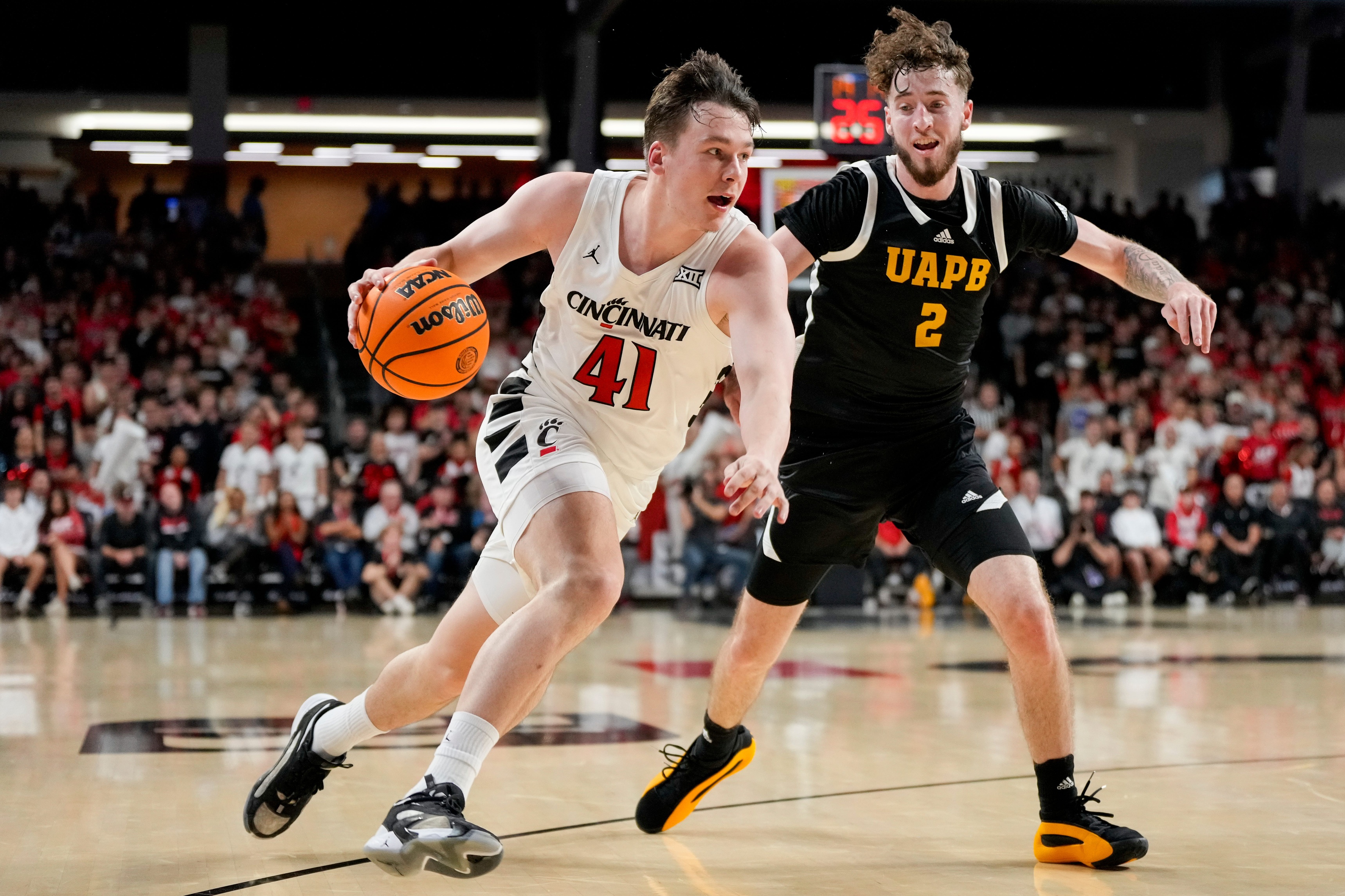 college basketball picks Simas Lukosius Cincinnati Bearcats predictions best bet odds