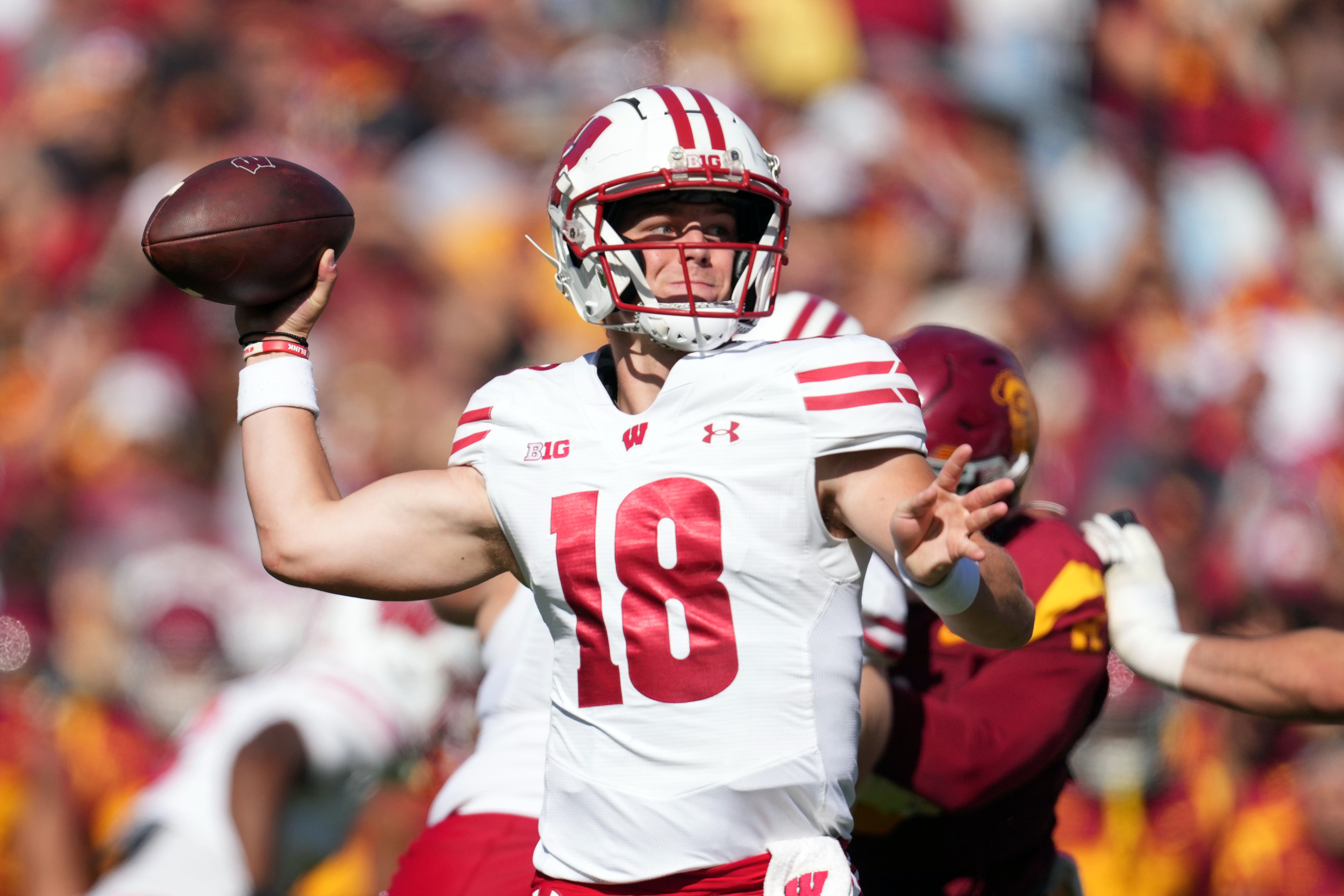 college football picks Braedyn Locke Wisconsin Badgers predictions best bet odds