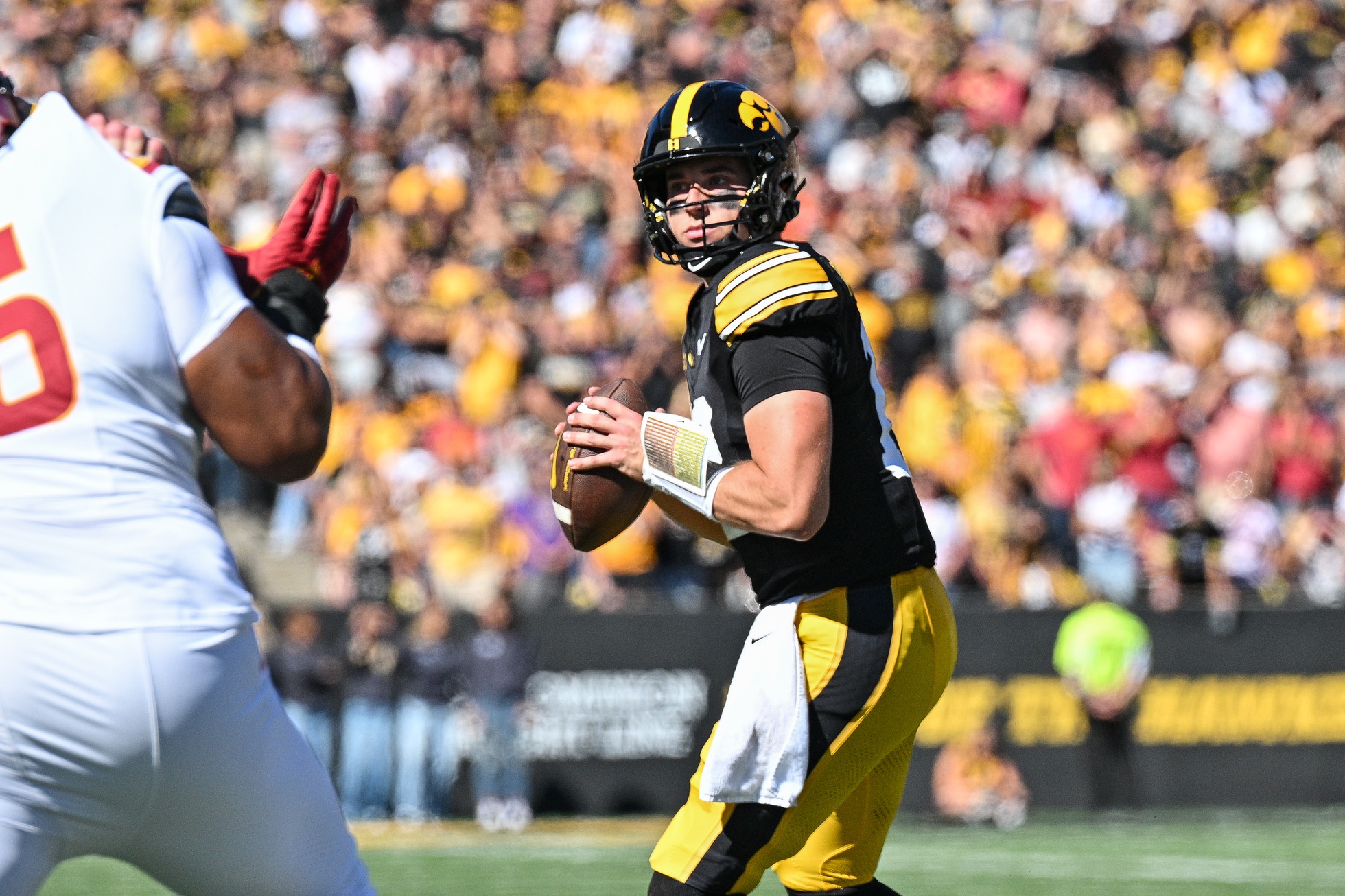 college football picks Cade McNamara Iowa Hawkeyes predictions best bet odds