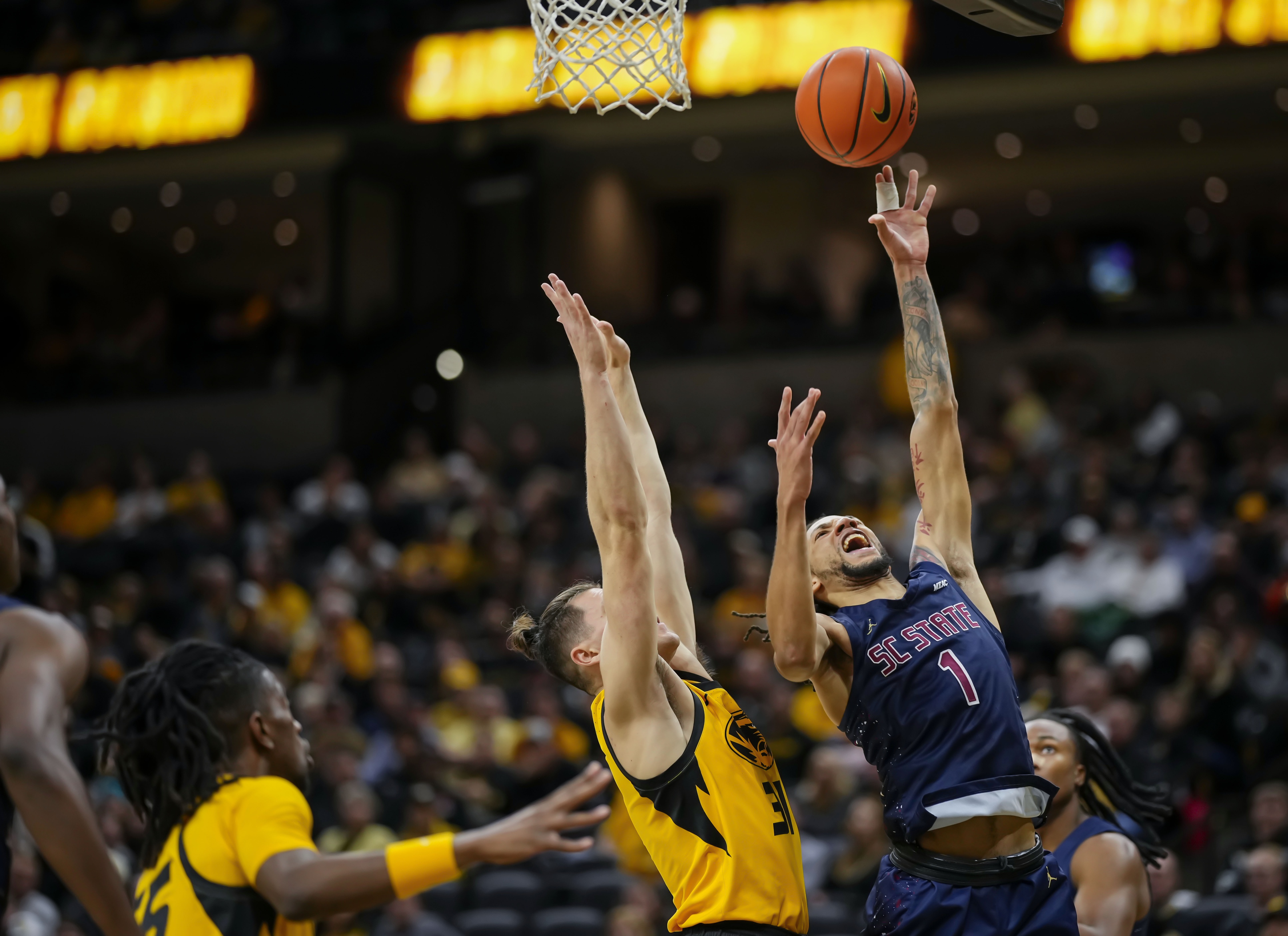 College basketball handicapping roundup Caleb Grill Missouri Tigers