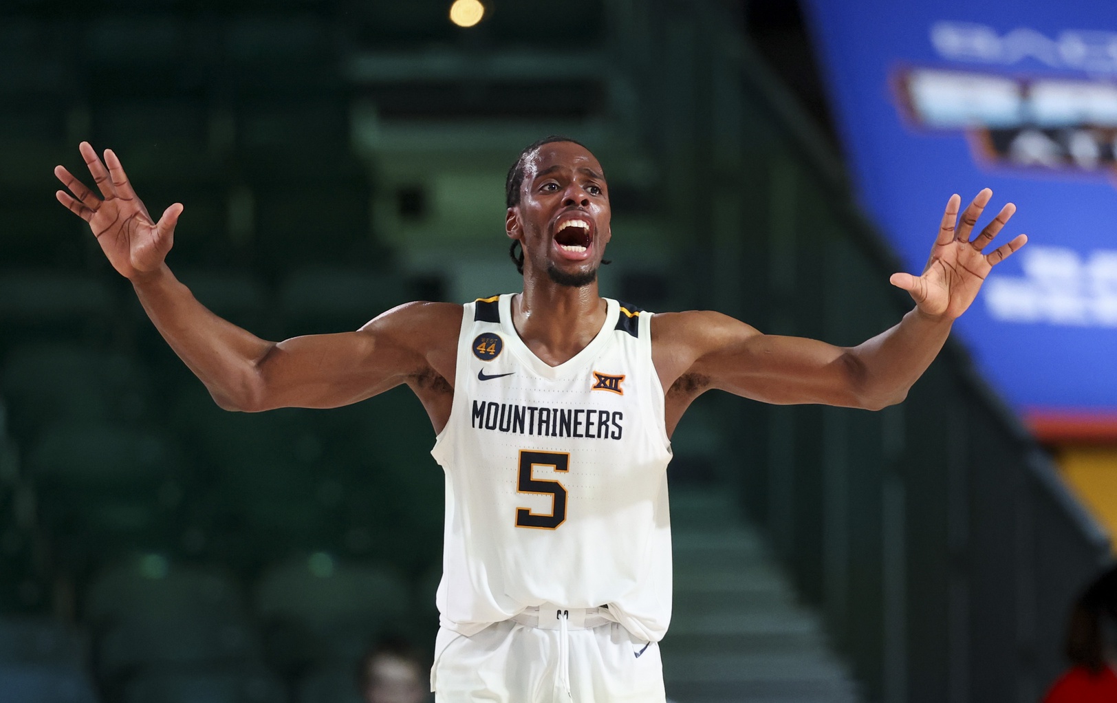 college basketball picks Toby Okani West Virginia Mountaineers predictions best bet odds