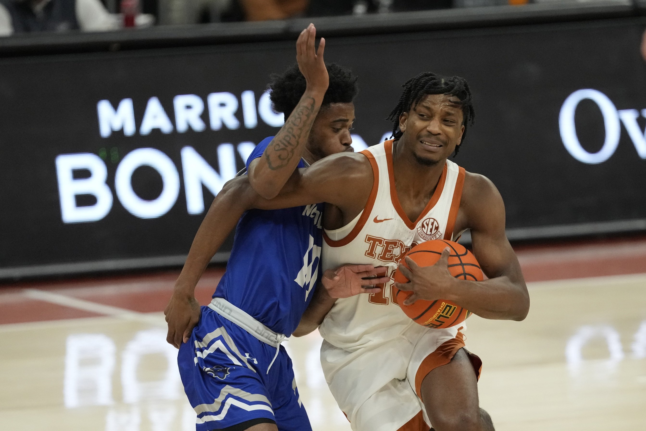 college basketball picks Tramon Mark Texas Longhorns predictions best bet odds