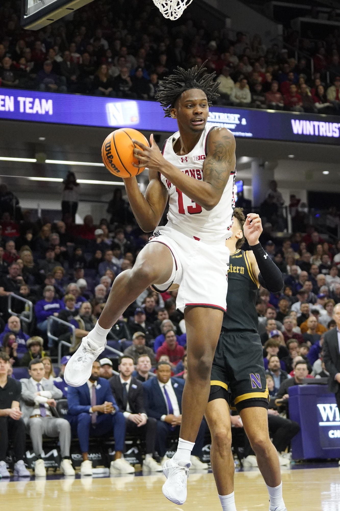 college basketball picks Xavier Amos Wisconsin Badgers predictions best bet odds